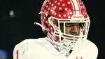 DeShaun Williams warms up for Naperville Central football.