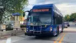 PACE bus on Naperville street next to Naperville sign