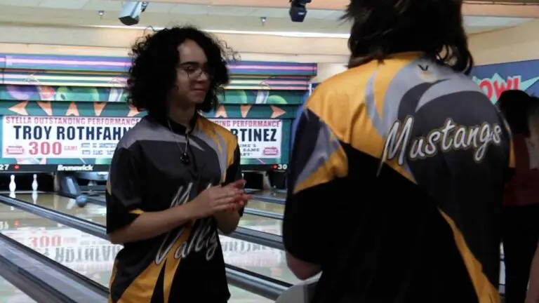 Metea Valley bowling members talk after a game against Naperville Central.