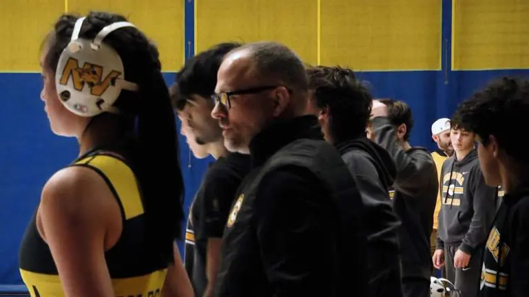 Neuqua Valley wrestling team gets ready for lineup intros against Waubonsie.