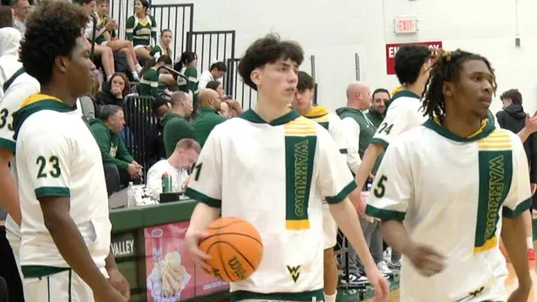 Waubonsie boys basketball players warm up before they take on Naperville Central.