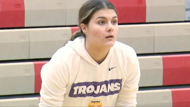 Downers Grove North girls basketball player warms up before facing Neuqua in the IHSA Regional Semifinals.