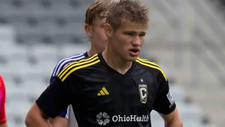 Chase Adams looks around the field in a game for the Columbus Crew 2.