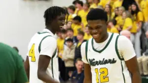 Tyreek Coleman and Moses Wilson smile before the DVC game against Neuqua Valley.