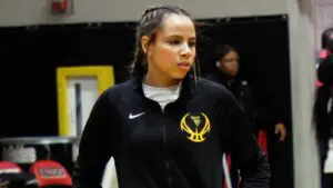 Waubonsie Girls basketball player Danyella Mporokoso warms up before playing Bolingbrook.