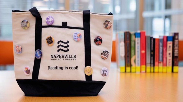 Naperville Public Library tote bag with category buttons.