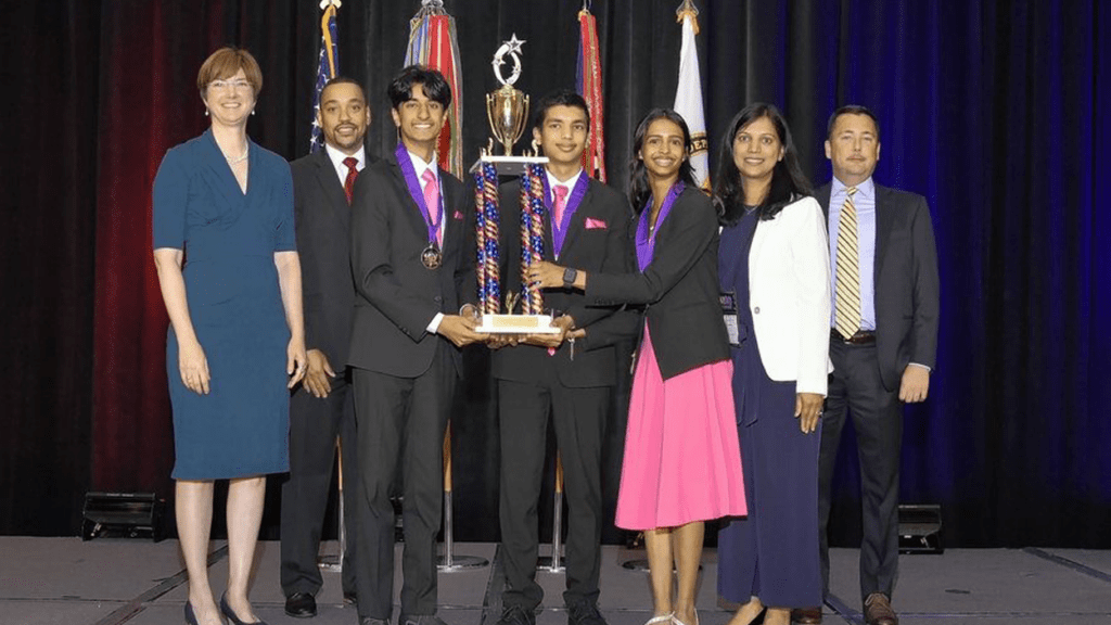 Team Urica with the trophy after winning first place at eCYBERMISSION STEM competition