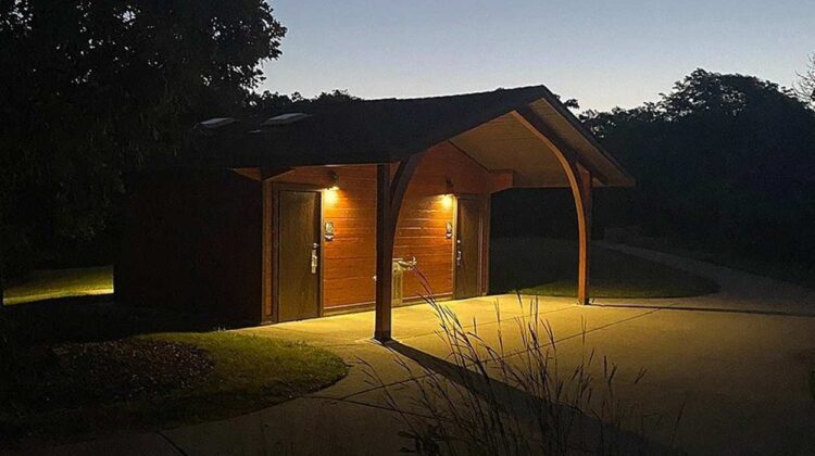 Dimly lit building on forest preserve site