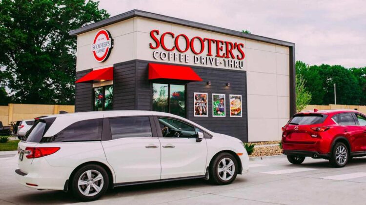 Exterior shot of cars at Scooter's Coffee, a drive-thru coffee shop