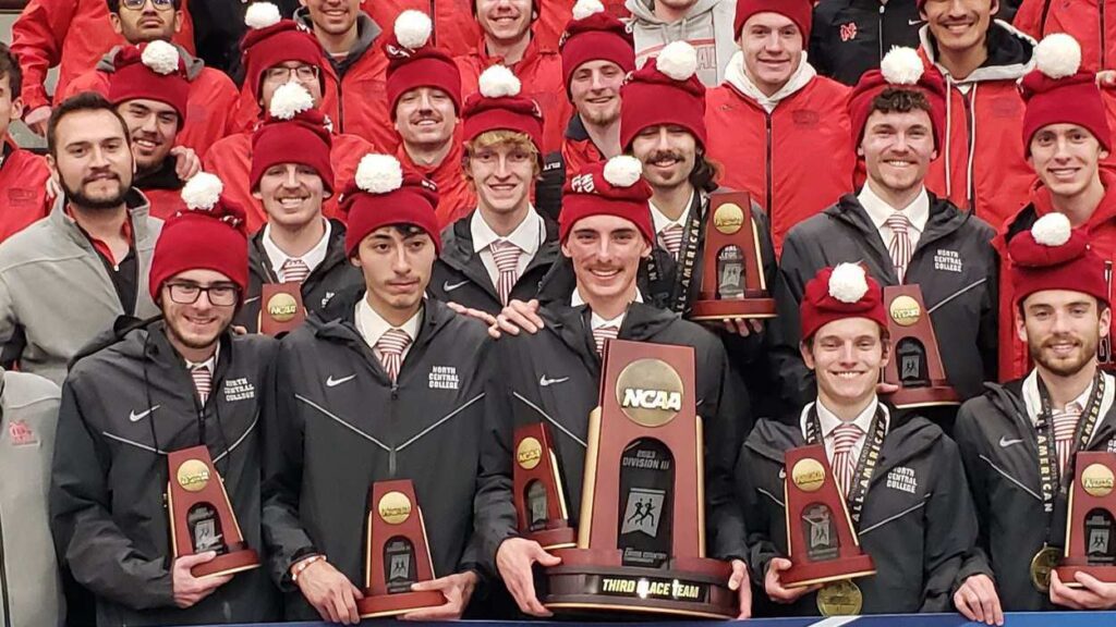 North Central College men's cross country with third place trophy at Nationals