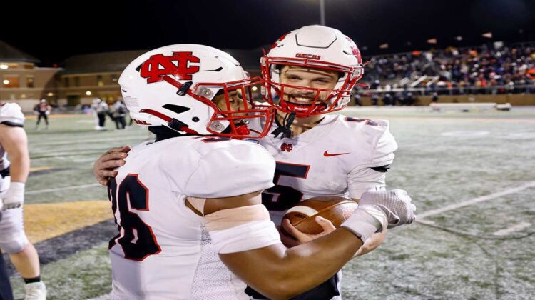 North Central College football celebrates 34-27 semifinal win over Wartburg