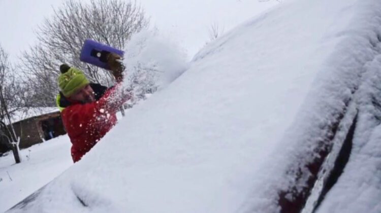 Winter snow on a car's windshield