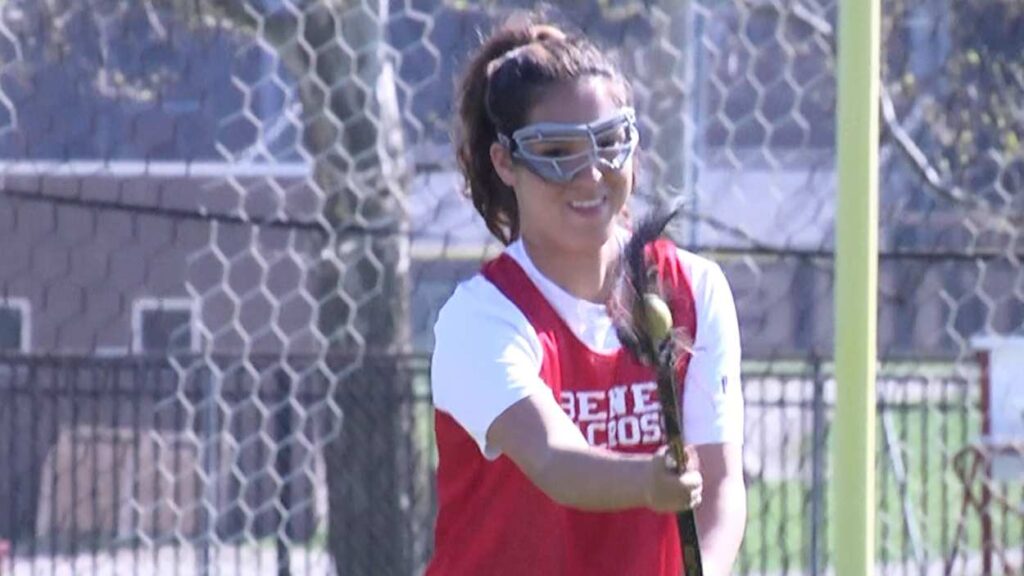 Benet academy girls lacrosse player warms up before playing St. Charles Co-Op