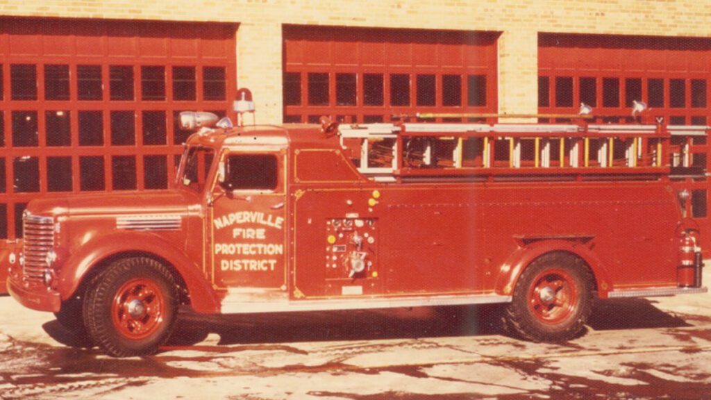 One of Naperville Fire Depatment's old trucks outside of the fire station