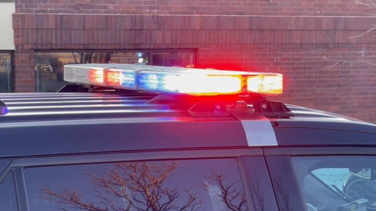 Police lights on top of police car for story about shoplifting