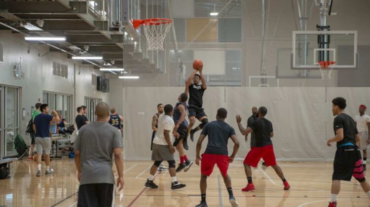 Basketball players in an indoor space in the Naperville Park District