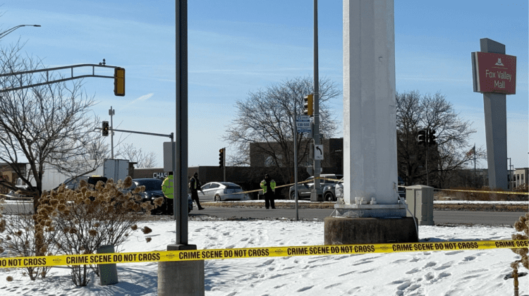 First responders at scene of collision on Route 59, with caution tape in foreground and roadway and cars in background