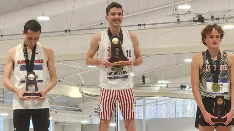 Braden Nicholsen on top of the medal stand as one of the North Central winter sports All Americans